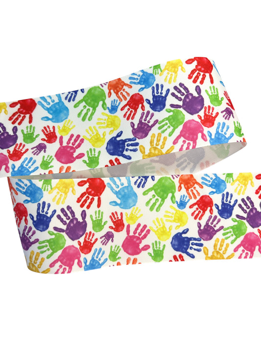 Manos de colores de 7,5 cm para concienciar sobre el autismo